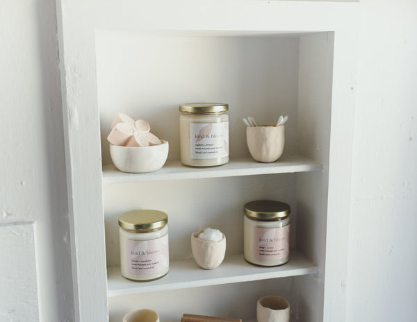 calming soy candle displayed on shelf